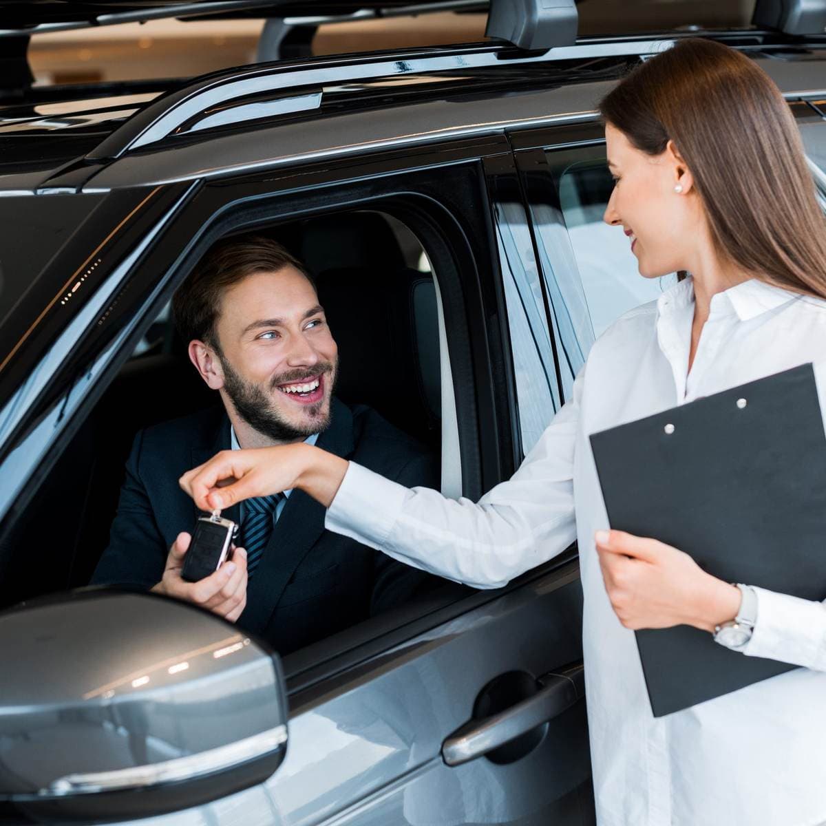 Car keys being exchanged